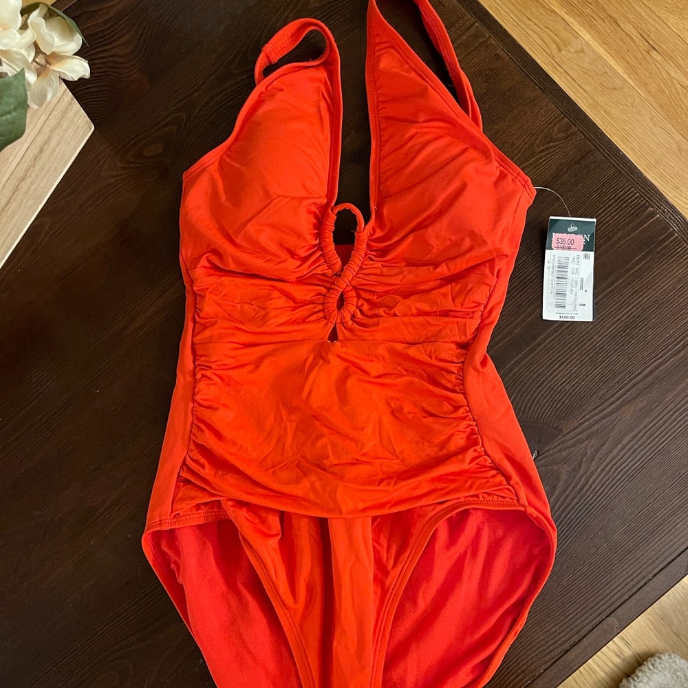 Never worn , Ralph Lauren orange one piece bathing suit !!!